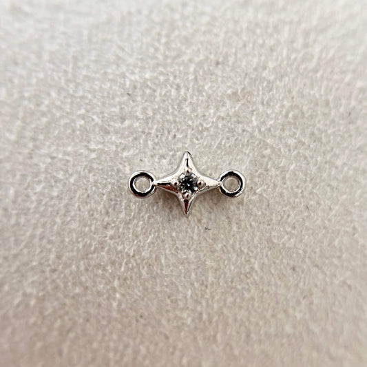 Sterling silver accent star charm, designed for delicate permanent jewellery stacks.