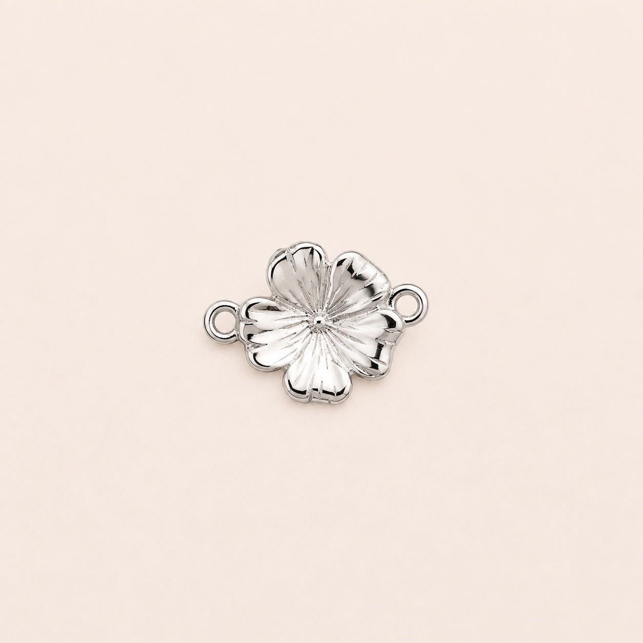 Sterling silver flower charm for permanent jewellery