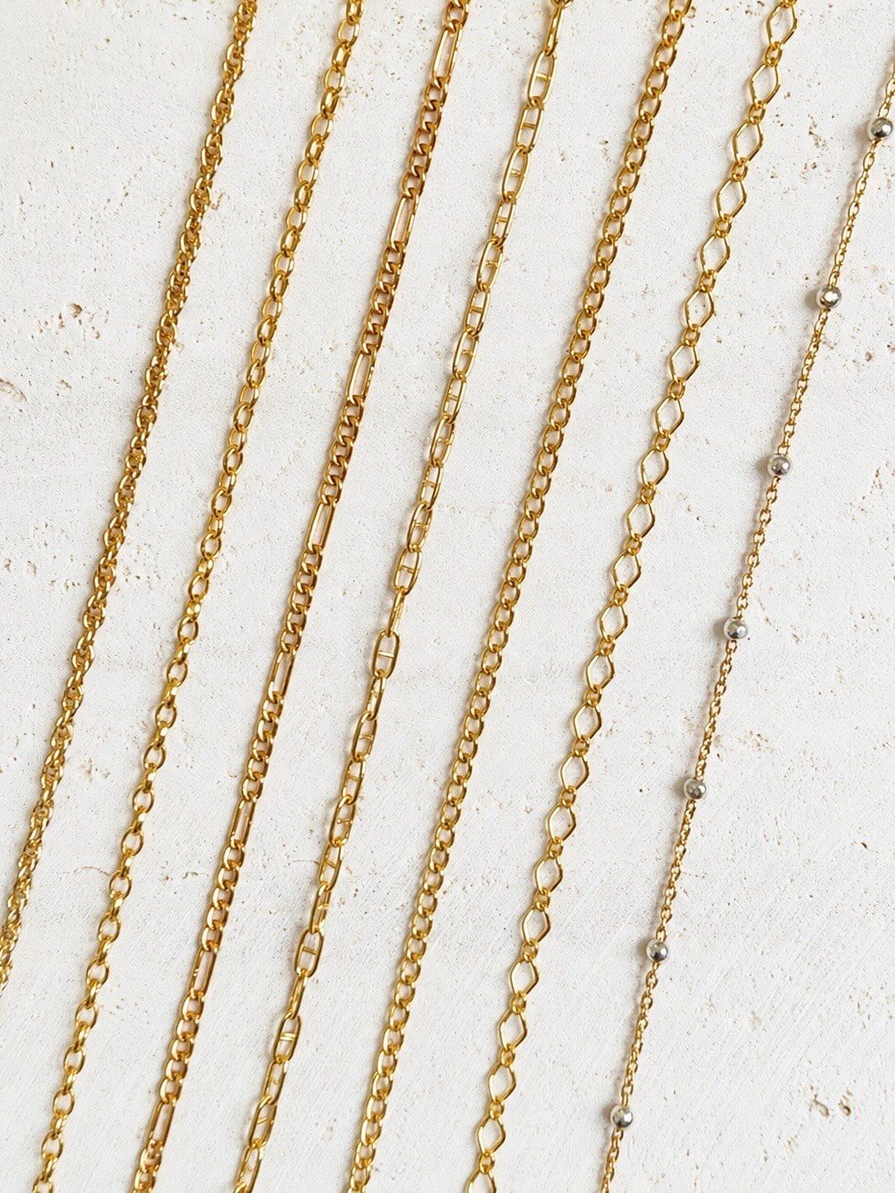 A selection of gold permanent jewellery chains